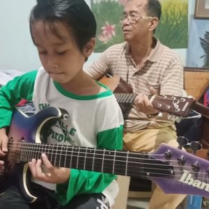 Play along While My Guitar Gently Weeps with my grandpa
